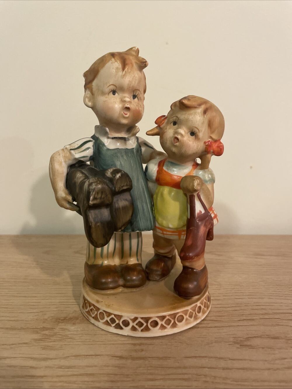 VTG 6” Royal Sealy Japan Boy Girl Holding Boots Together Figurine